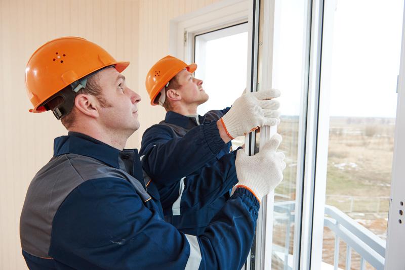 Two Window Installation Experts Installing Casement Windows in North Carolina.