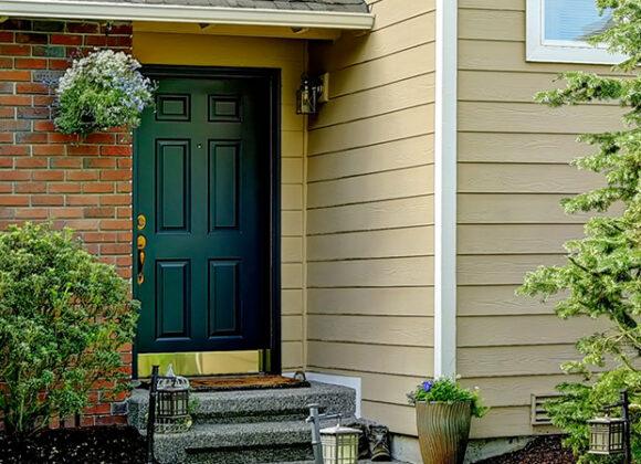 the front of a home showcasing one of their new Front Doors in Wake Forest, Chapel Hill, Durham, Chapel Hill, Cary