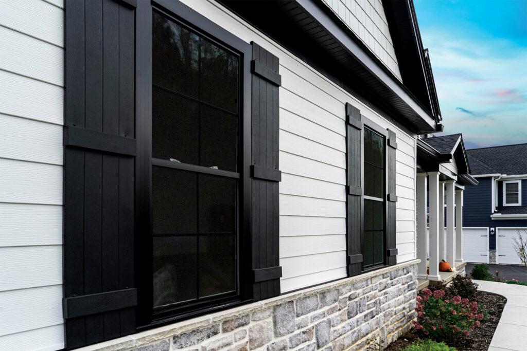 a home with black Composite Replacement Windows in Durham