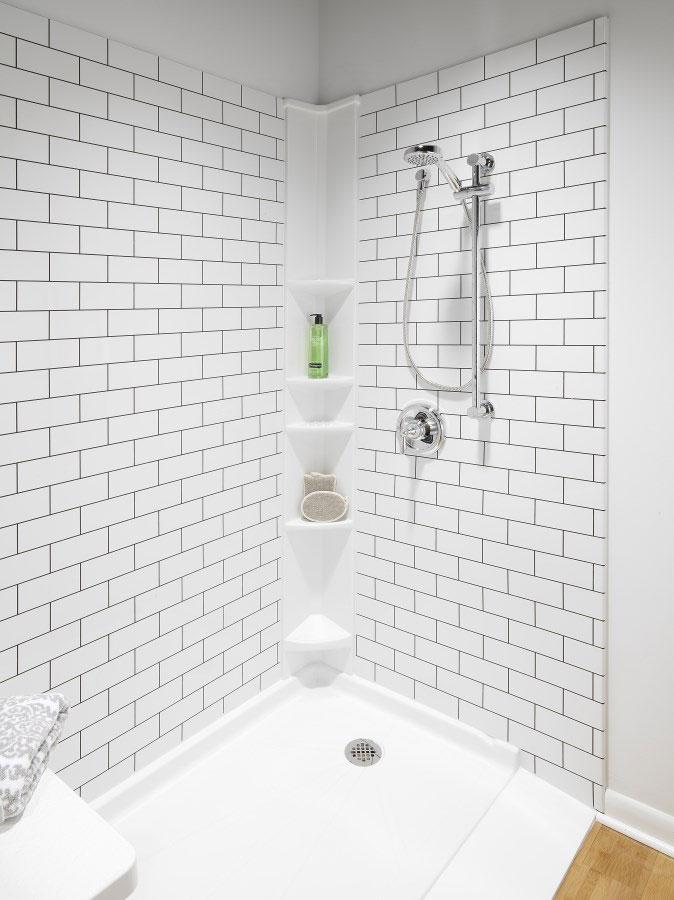 Tub to Shower Conversion completed in Raleigh, NC, with white subway tiles